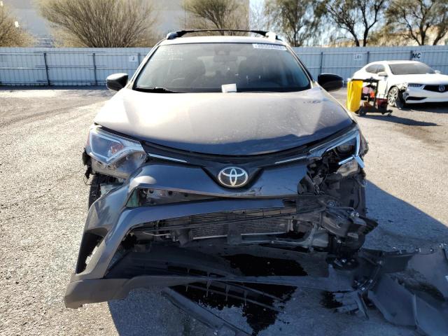 Photo 5 from auction – 2017 TOYOTA RAV4 LE with VIN JTMZFREV5HJ114354