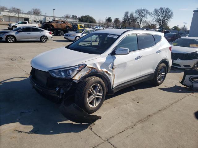 HYUNDAI SANTA FE S 2018 with VIN 5NMZU3LBXJH097302 - Photo from auction