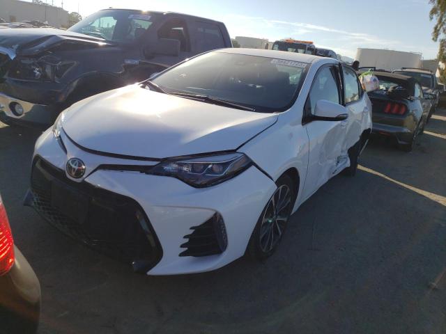 TOYOTA COROLLA L 2019 with VIN 2T1BURHE7KC211416 - Photo from auction