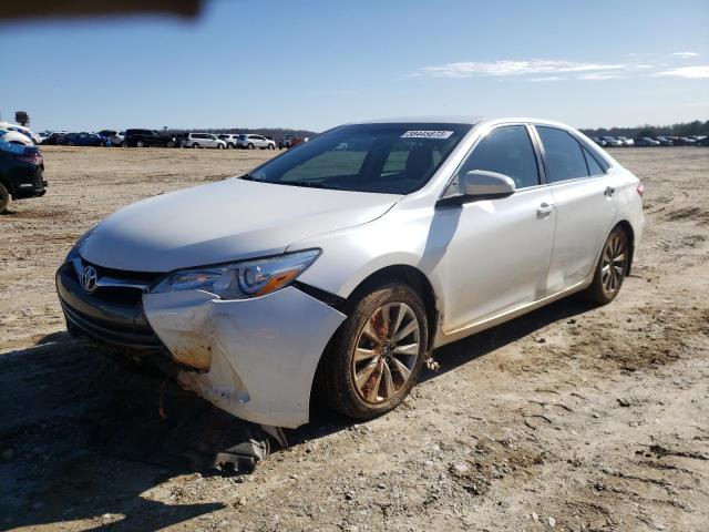 TOYOTA CAMRY LE 2017 with VIN 4T1BF1FK2HU330731 - Photo from auction