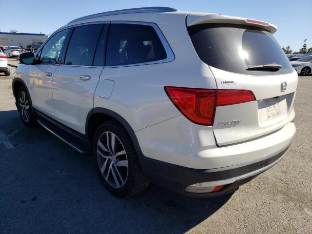 Photo 2 from auction – 2017 HONDA PILOT TOUR with VIN 5FNYF5H92HB017462