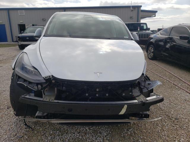Photo 5 from auction – 2022 TESLA MODEL Y with VIN 7SAYGDEF3NF319939