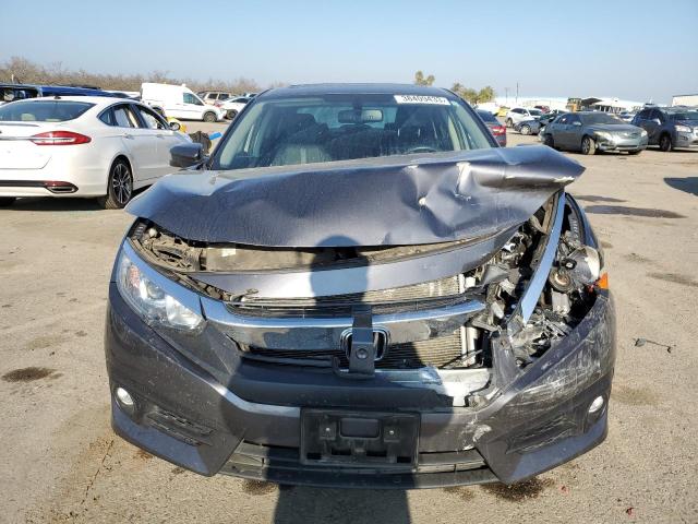 Photo 5 from auction – 2018 HONDA CIVIC EXL with VIN JHMFC1F76JX042448