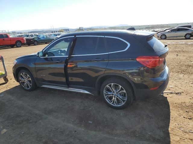 Photo 2 from auction – 2017 BMW X1 XDRIVE2 with VIN WBXHT3Z34H4A57594