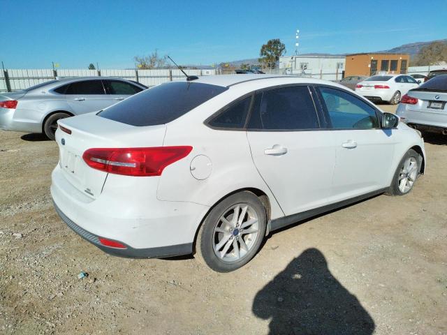 Photo 3 from auction – 2016 FORD FOCUS SE with VIN 1FADP3F21GL268965