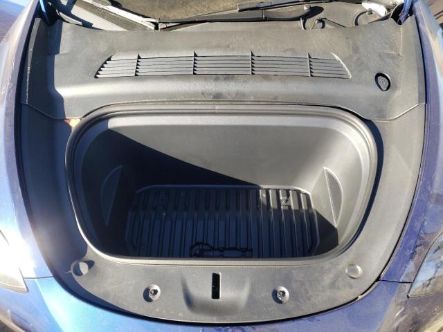 Photo 12 from auction – 2022 TESLA MODEL Y with VIN 7SAYGDEE2NF560821