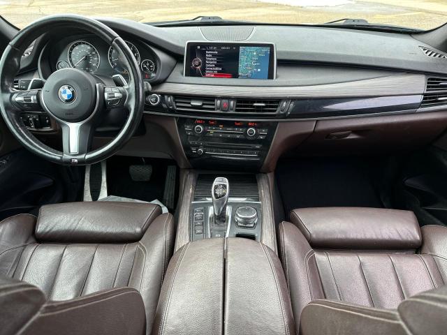 Photo 9 from auction – 2015 BMW X5 XDRIVE3 with VIN 5UXKR0C59F0P01634