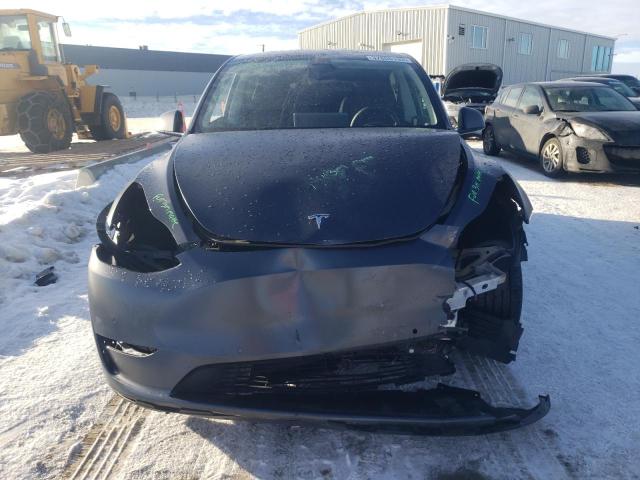 Photo 5 from auction – 2022 TESLA MODEL Y with VIN 7SAYGDEE7NF563617