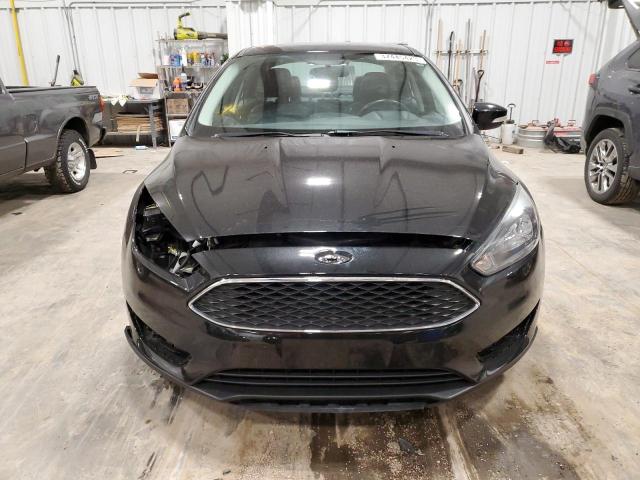 Photo 5 from auction – 2015 FORD FOCUS SE with VIN 1FADP3F22FL255978