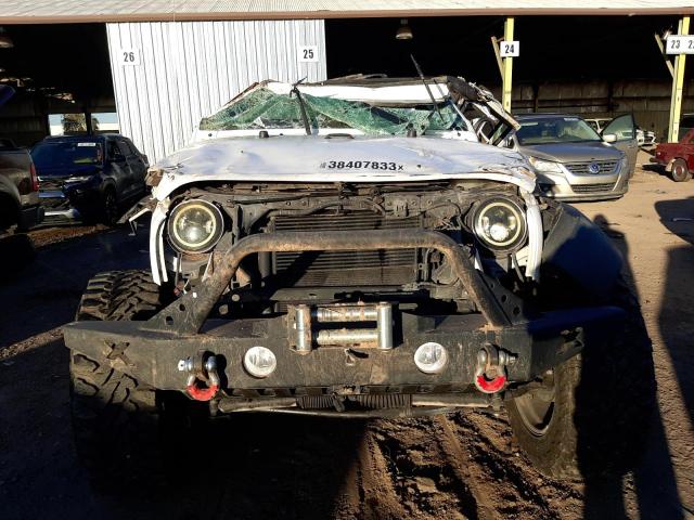 Photo 5 from auction – 2015 JEEP WRANGLER U with VIN 1C4BJWDG5FL698757