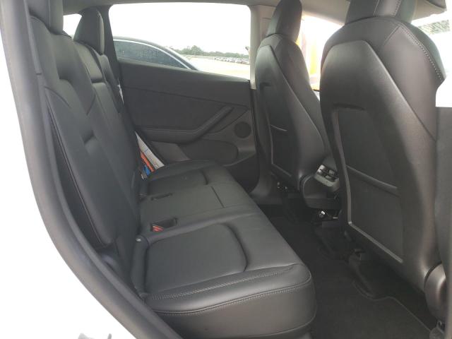 Photo 11 from auction – 2022 TESLA MODEL Y with VIN 7SAYGDEF3NF319939