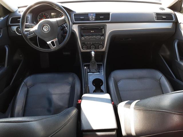 Photo 8 from auction – 2014 VOLKSWAGEN PASSAT S with VIN 1VWAP7A34EC003410
