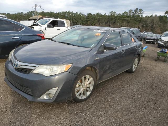 TOYOTA CAMRY HYBR 2012 with VIN 4T1BD1FKXCU028523 - Photo from auction