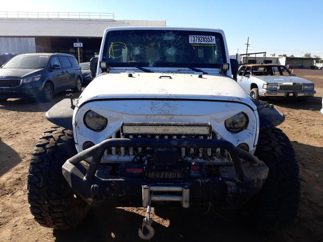 Photo 5 from auction – 2014 JEEP WRANGLER U with VIN 1C4BJWFG0EL230169