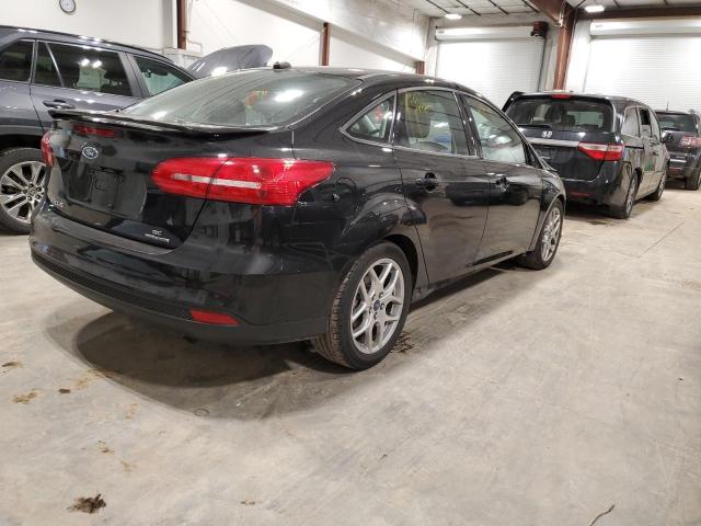 Photo 3 from auction – 2015 FORD FOCUS SE with VIN 1FADP3F22FL255978