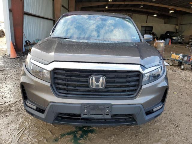 Photo 5 from auction – 2022 HONDA RIDGELINE with VIN 5FPYK3F74NB024353