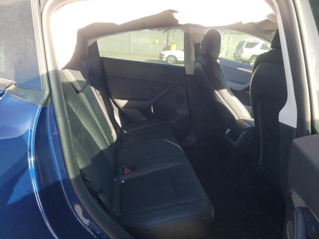 Photo 11 from auction – 2022 TESLA MODEL Y with VIN 7SAYGDEE2NF560821