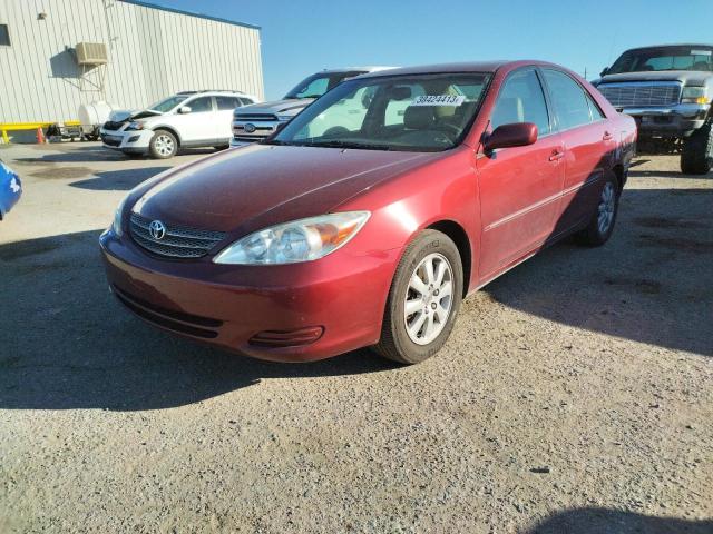 TOYOTA CAMRY LE 2002 with VIN JTDBF30K320004878 - Photo from auction