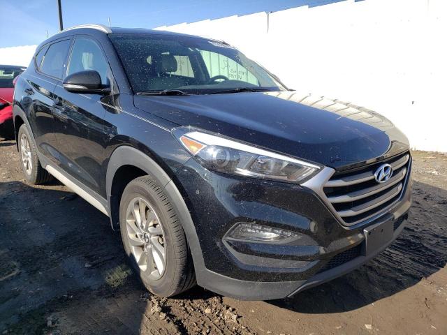 Photo 4 from auction – 2018 HYUNDAI TUCSON SEL with VIN KM8J3CA46JU759546