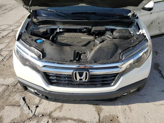 Photo 11 from auction – 2018 HONDA RIDGELINE with VIN 5FPYK3F53JB004927