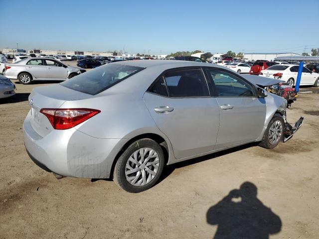 Photo 3 from auction – 2018 TOYOTA COROLLA L with VIN 5YFBURHE7JP752223
