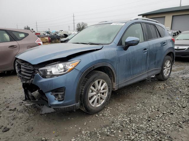 MAZDA CX-5 TOURI 2016 with VIN JM3KE4CY1G0848375 - Photo from auction