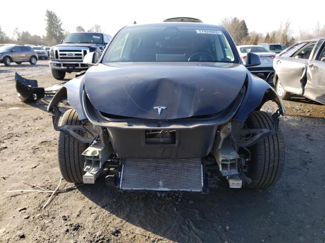 Photo 5 from auction – 2021 TESLA MODEL Y with VIN 5YJYGDEE1MF215422