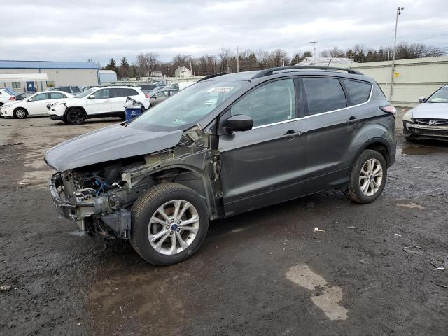 FORD ESCAPE SE 2018 with VIN 1FMCU0GD4JUA18923 - Photo from auction