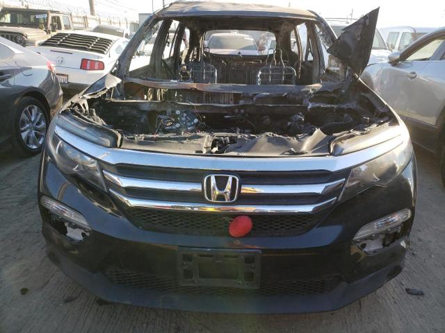 Photo 5 from auction – 2017 HONDA PILOT LX with VIN 5FNYF5H13HB047094