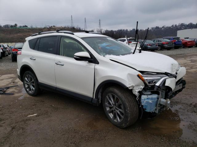 Photo 4 from auction – 2018 TOYOTA RAV4 with VIN JTMDFREV3JJ748326