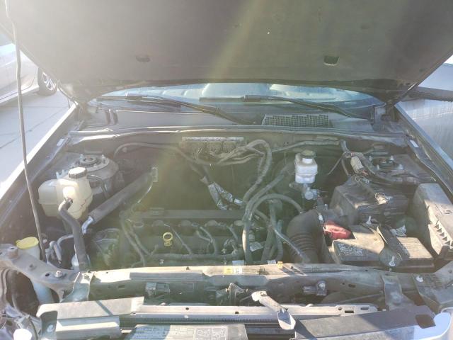 Photo 12 from auction – 2009 FORD ESCAPE LIM with VIN 1FMCU04709KB20256