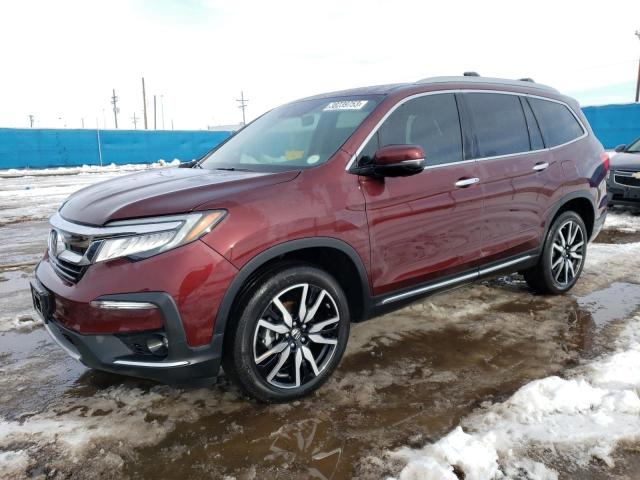 HONDA PILOT TOUR 2020 with VIN 5FNYF6H60LB035169 - Photo from auction