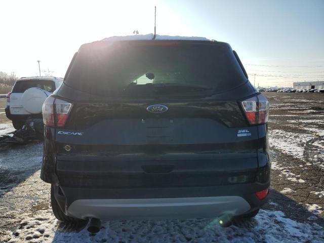 Photo 6 from auction – 2018 FORD ESCAPE SEL with VIN 1FMCU9HD7JUB66244