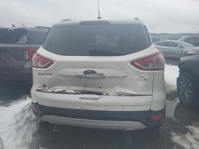 Photo 6 from auction – 2016 FORD ESCAPE SE with VIN 1FMCU9GX7GUB01706