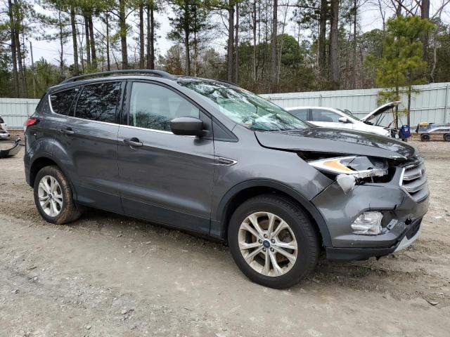 Photo 4 from auction – 2018 FORD ESCAPE SE with VIN 1FMCU9GD1JUC31493