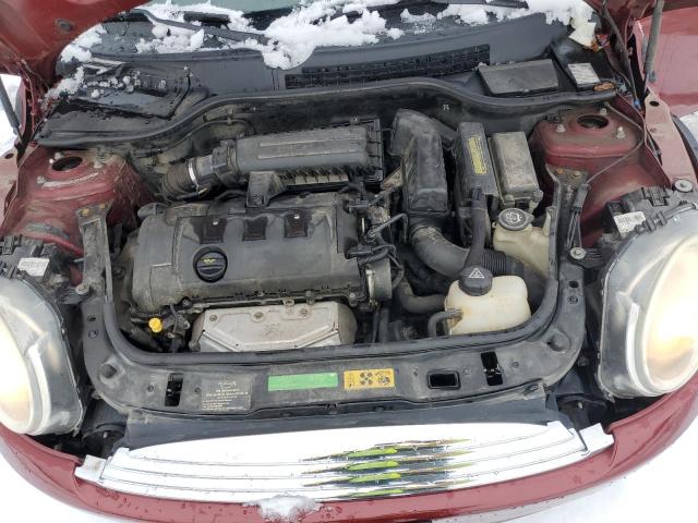 Photo 11 from auction – 2009 MINI COOPER with VIN WMWMF335X9TU69713