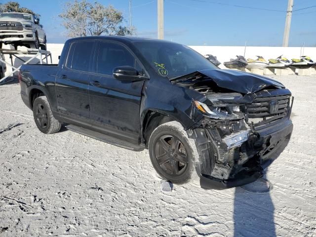 Photo 4 from auction – 2022 HONDA RIDGELINE with VIN 5FPYK3F82NB010993