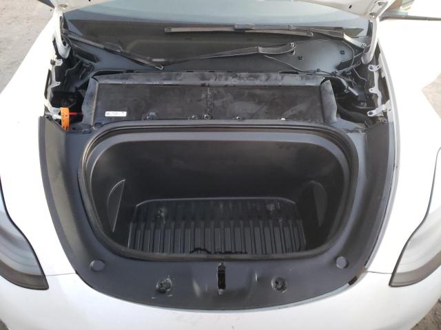Photo 12 from auction – 2022 TESLA MODEL Y with VIN 7SAYGDEEXNF330282