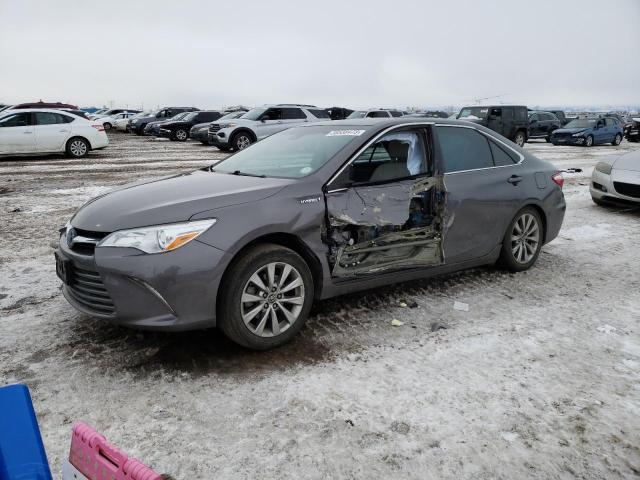 TOYOTA CAMRY HYBR 2016 with VIN 4T1BD1FKXGU199049 - Photo from auction