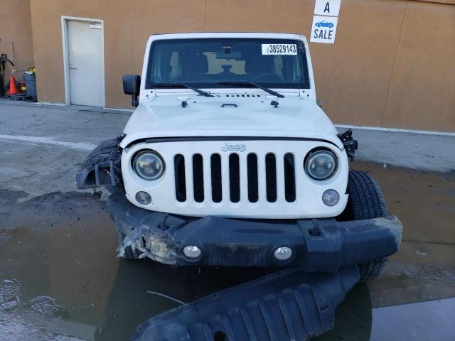 Photo 5 from auction – 2014 JEEP WRANGLER U with VIN 1C4BJWDG2EL233318
