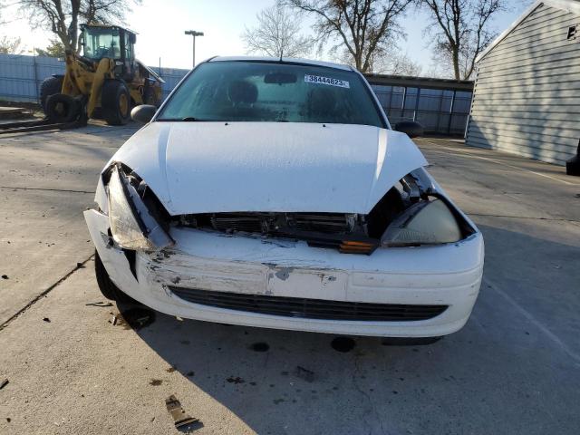 Photo 5 from auction – 2004 FORD FOCUS LX with VIN 1FAFP33ZX4W140387