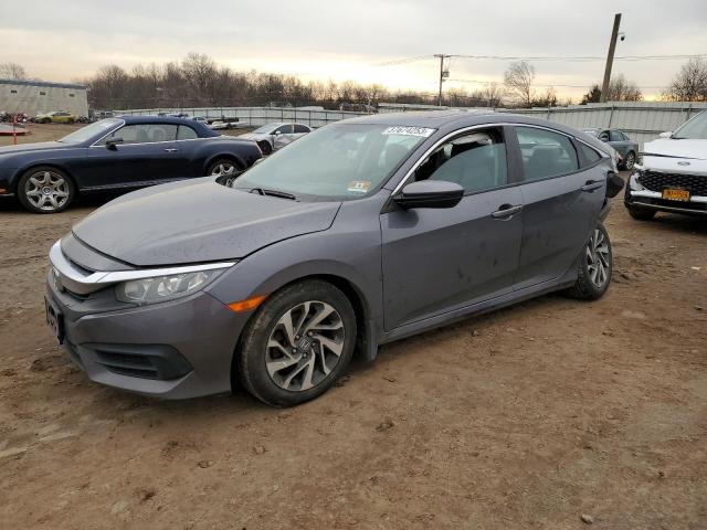 HONDA CIVIC EX 2017 with VIN 2HGFC2F75HH559487 - Photo from auction