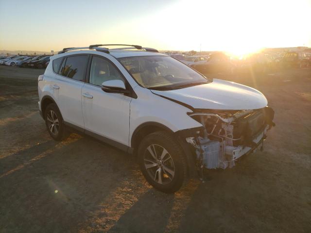 Photo 4 from auction – 2016 TOYOTA RAV4 XLE with VIN JTMWFREV8GJ099320