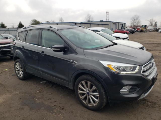 Photo 4 from auction – 2017 FORD ESCAPE TIT with VIN 1FMCU9JD9HUE28706