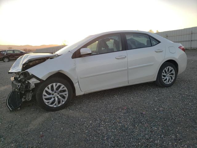 TOYOTA COROLLA L 2017 with VIN 5YFBURHE5HP679282 - Photo from auction