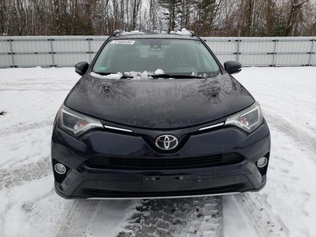 Photo 5 from auction – 2017 TOYOTA RAV4 XLE with VIN 2T3RFREV8HW651141