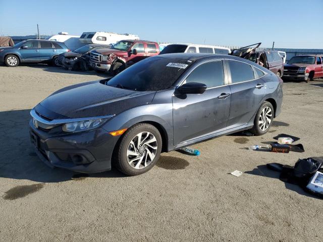 HONDA CIVIC EX 2018 with VIN 2HGFC2F88JH559630 - Photo from auction