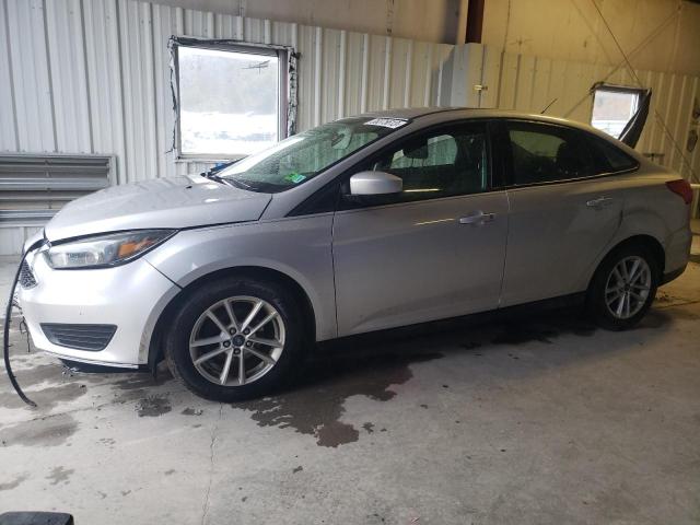 FORD FOCUS SE 2018 with VIN 1FADP3F26JL239758 - Photo from auction