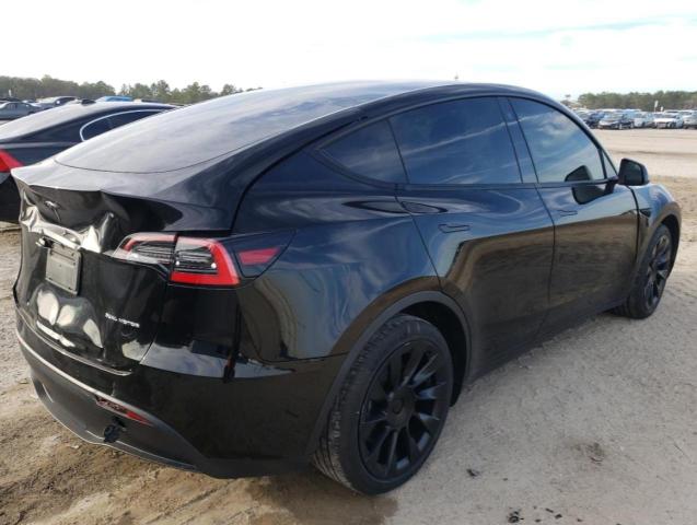 Photo 3 from auction – 2021 TESLA MODEL Y with VIN 5YJYGDEE4MF141140
