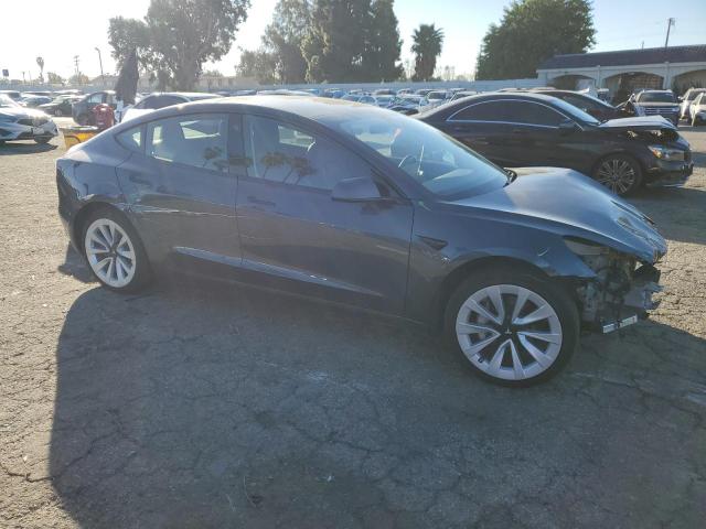 Photo 4 from auction – 2022 TESLA MODEL 3 with VIN 5YJ3E1EB1NF143045